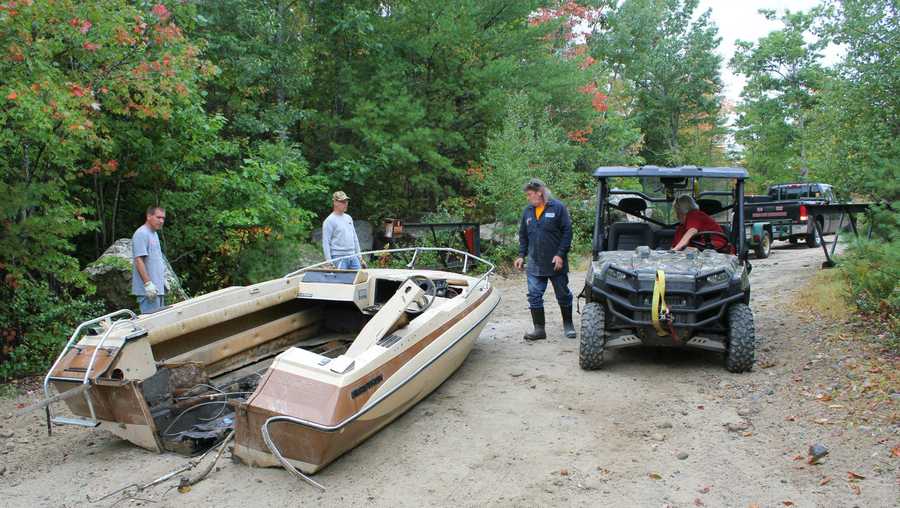 Dumped motorboat cleared as part of garbage clean-up