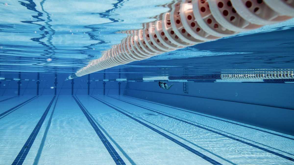 Girl nearly drowns after hair gets stuck in pool filter, mom's warning