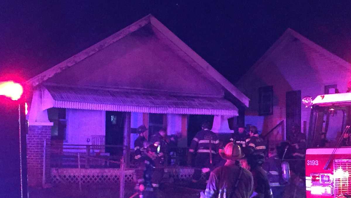 Woman taken to hospital after fire at KC home