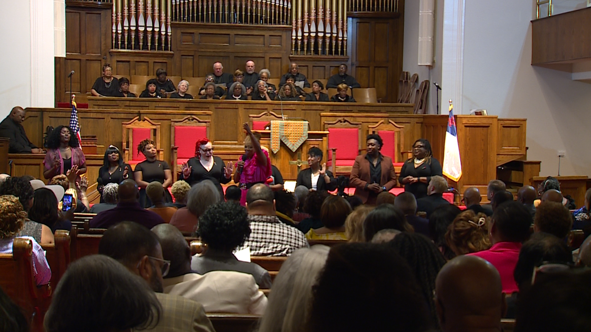 Leaders and community members gather at 16th Street Baptist Church
