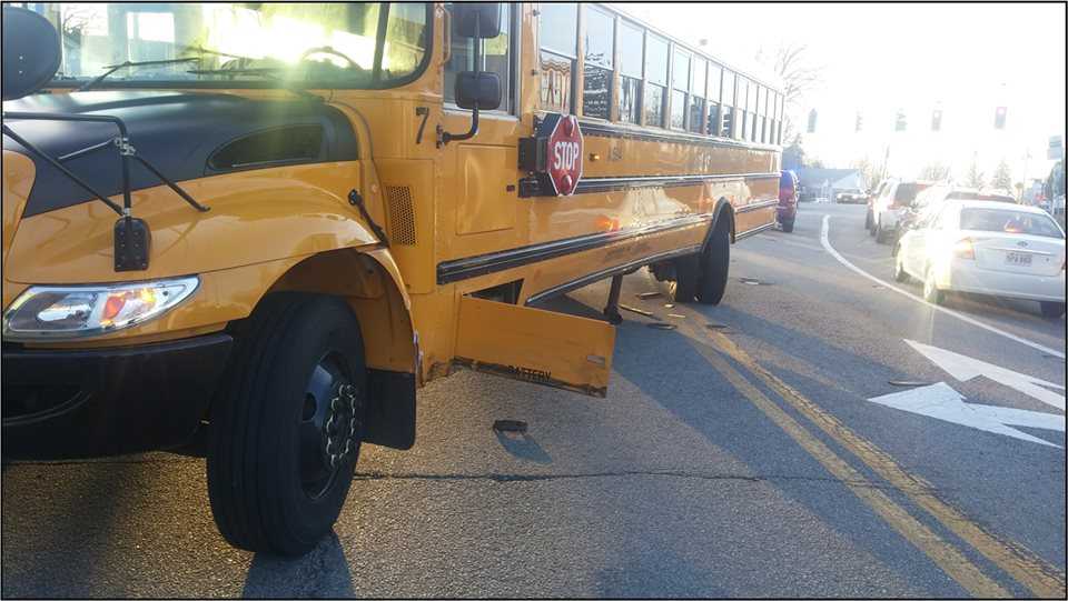 1 hurt in 2 car, school bus crash