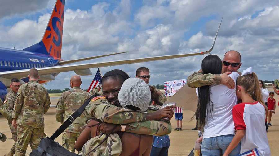 Louisiana National Guardsmen with the 1020th Engineer Company, 527th Engineer Battalion, 225th Engineer Brigade enthusiastically greet loved ones after returning from a nine-month deployment to Iraq, Afghanistan and Kuwait. (U.S. Army National Guard photo by Sgt. Garrett L. Dipuma)