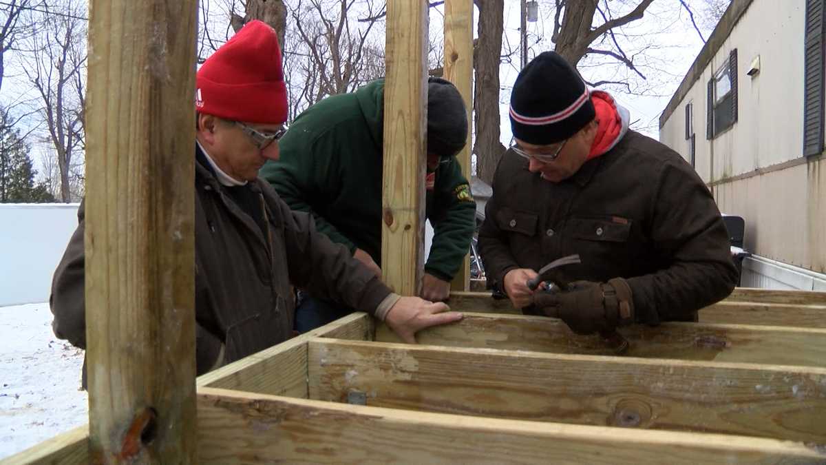 Volunteers build new wheelchair ramp for community member in need