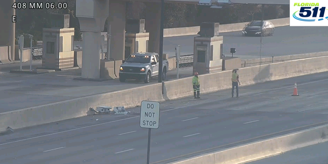 Toll camera falls on SR-408 in Orlando after dump truck hit it