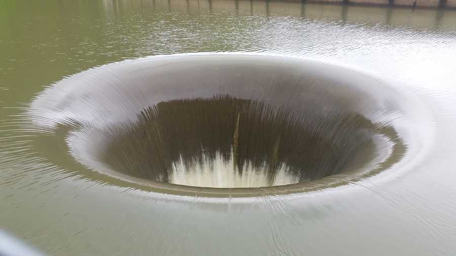 Water flows into the "Glory Hole" spillway at Lake Berryessa on Sunday, Feb. 19, 2017. The water spilled over Friday for the first time in 10 years.