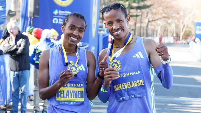 Fentaye Belayneh and Yemane Haileselassie pose with their medals following their wins in the 2024 Boston Half Marathon