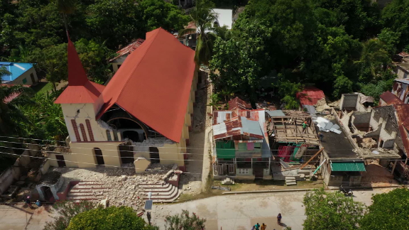 Drone footage above the town center of Corail shows the extent of the damage in this fishing village near the epicenter: the
church caved in and more than 3,300 homes were destroyed