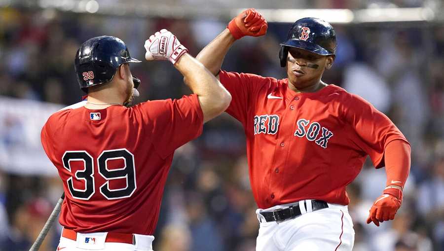 Boston Red Sox third baseman Rafael Devers celebrates his solo HR