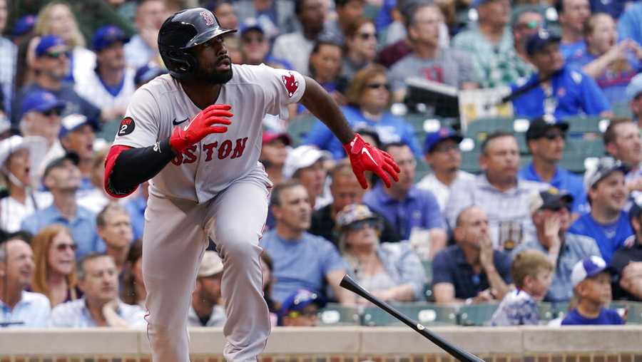 Boston Red Sox&apos;s Jackie Bradley Jr., watches after hitting a three-run double during the second inning of a baseball game against the Chicago Cubs in Chicago, Friday, July 1, 2022. (AP Photo/Nam Y. Huh)