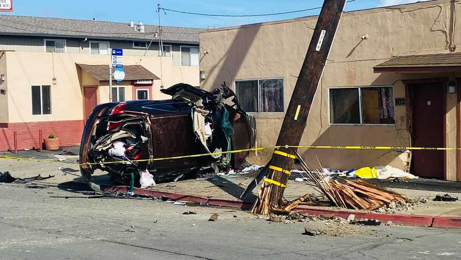 Car crashes through power pole and into building in Salinas