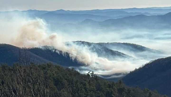 fire on one side of grandfather mountain