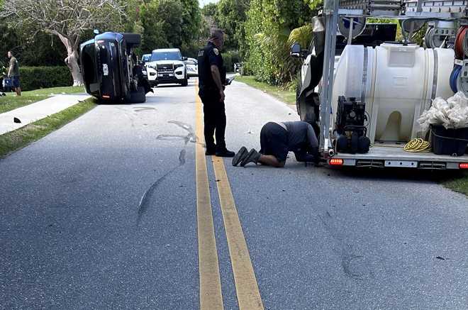 scene photos from the crash involving tiger woods in south florida.﻿