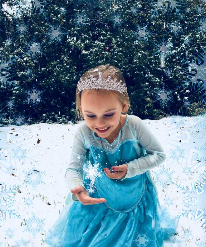 Nationwide snowstorms provide the perfect opportunity for 'Frozen' dress up