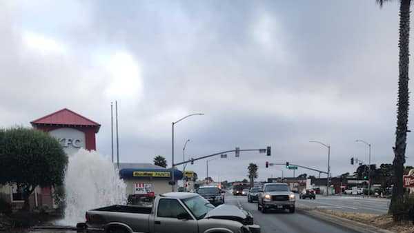 Roadway floods after driver crashes into Seaside fire hydrant