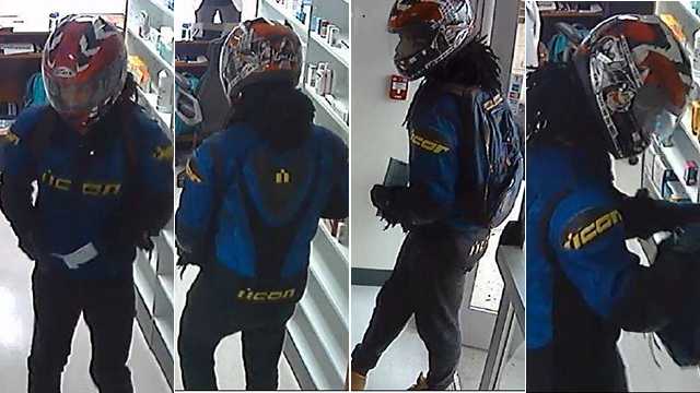 Armed man wears motorcycle helmet sought in pharmacy robbery