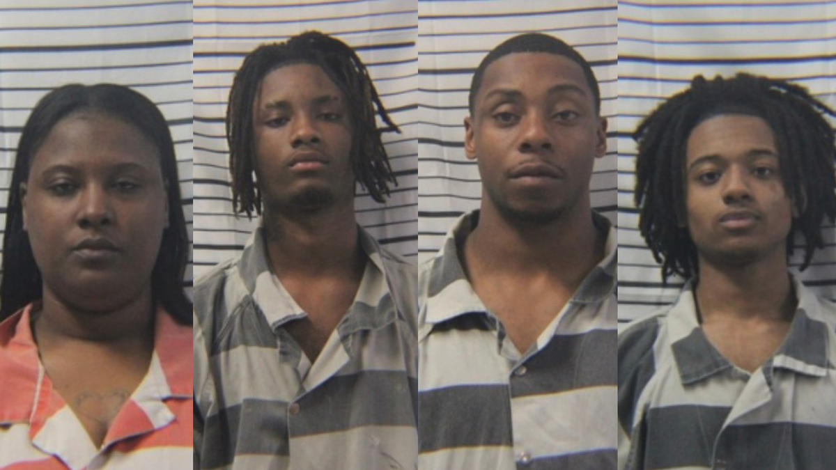 Mother charged after allegedly helping son conceal evidence in high school parking lot shooting