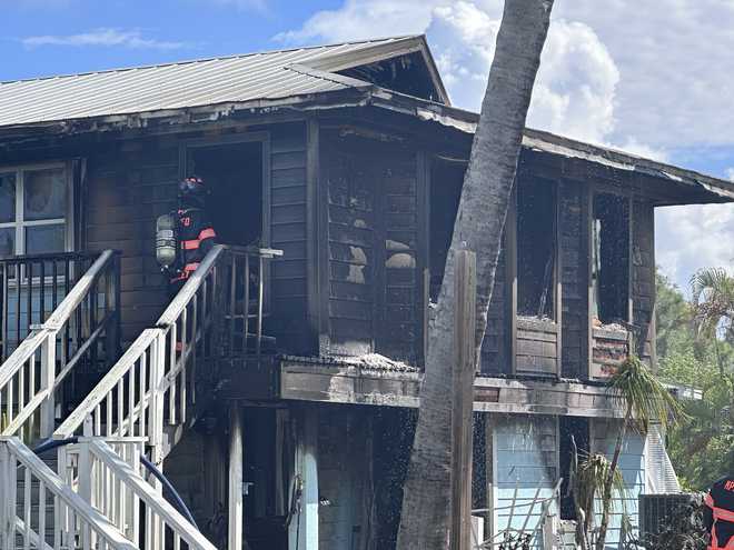 Smoke spews from Bokeelia home
