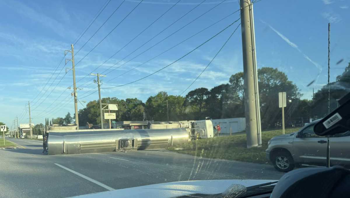 Photos: Semi-truck overturns on President St. in Savannah