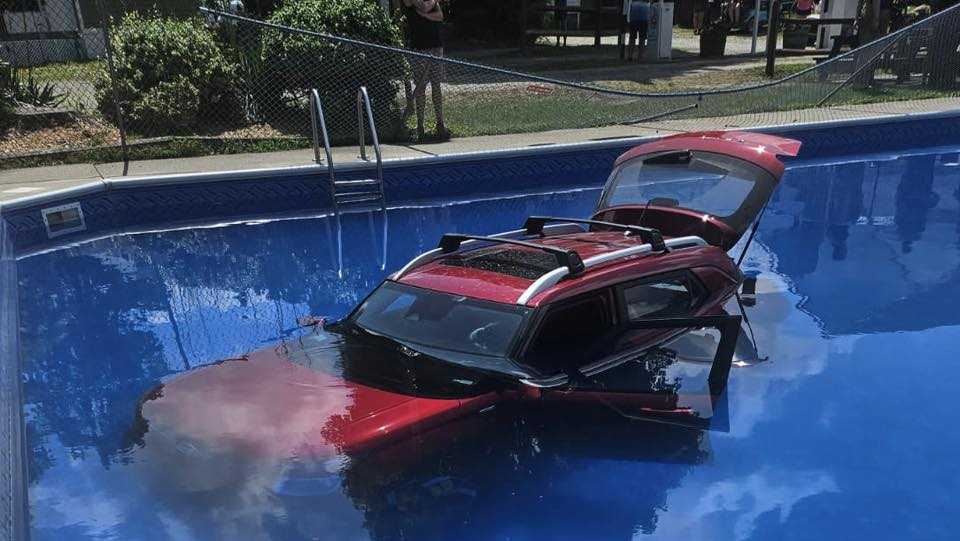 SUV Crashes into Pool, Narrowly Missing Swimmers in Monson Massachusetts