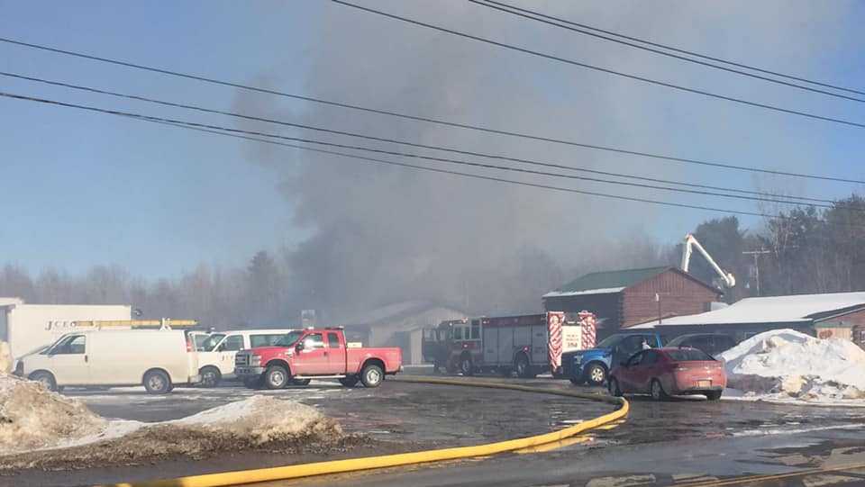 Multiple crews battle business fire on Military Turnpike