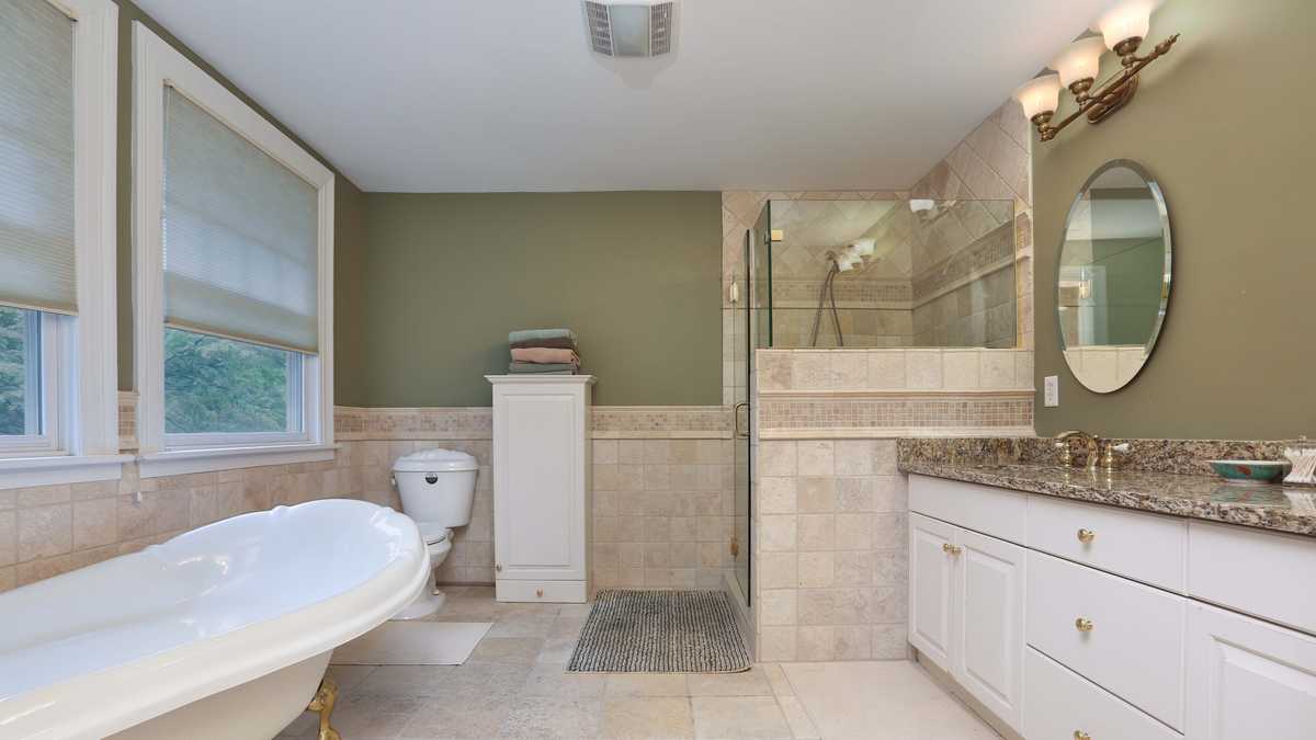 Gracious $2.29M colonial sits in most desirable neighborhood