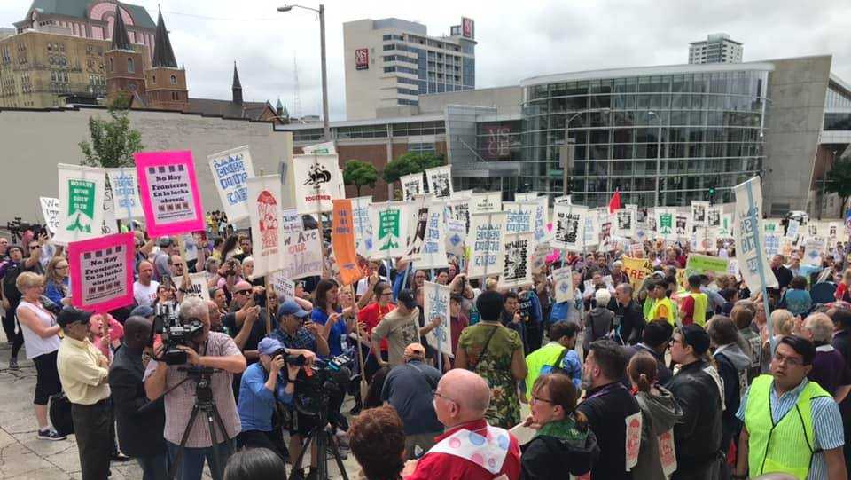 Demonstrators gather in Milwaukee to protest planned ICE immigration raids