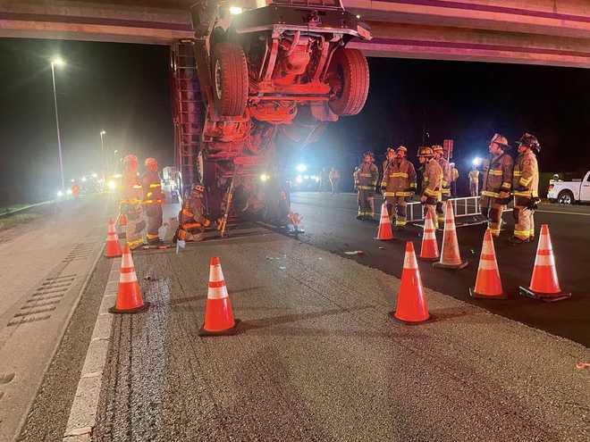 Dump truck strikes overpass bridge on I-95 in Martin County