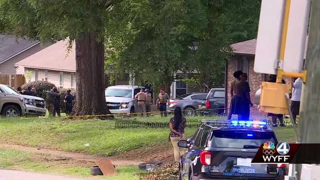 Cleveland Park shooting scene where suspect barricaded inside home