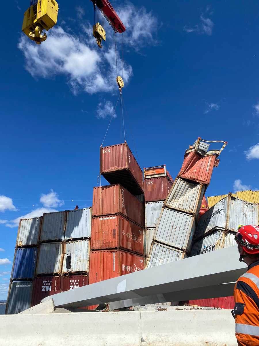 response crews began removing shipping containers using a floating crane barge at the site of the francis scott key bridge on april 7, 2024. the unified command is continuing efforts in support of removing the m/v dali, which is required to fully re-open the fort mchenry channel.