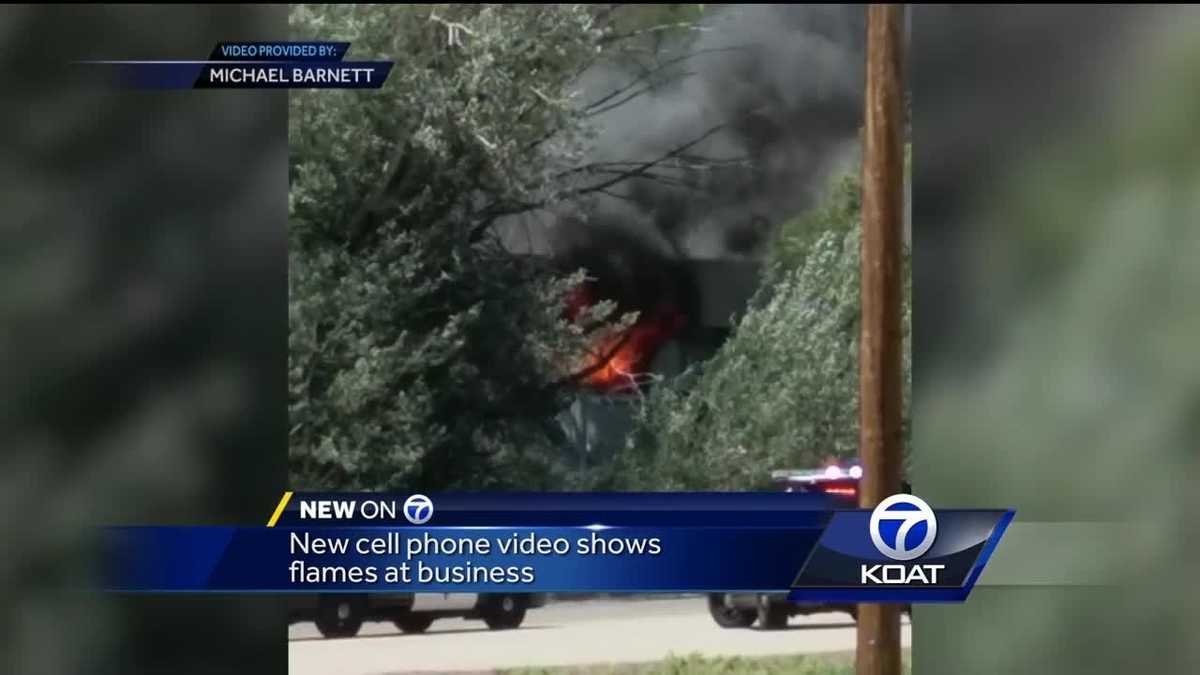 Business workers salvage belongings after standoff fire in Tijeras