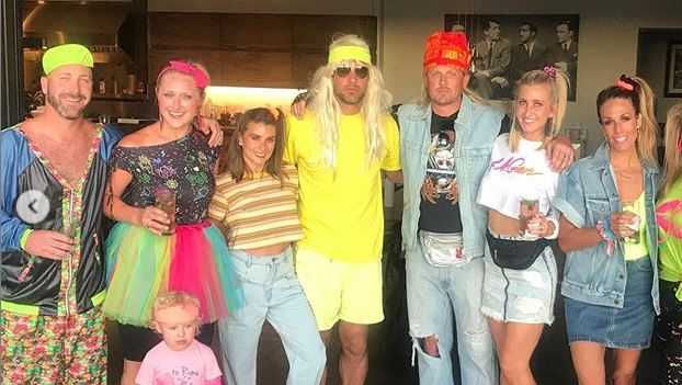 Aaron Rodgers & Danica Patrick dress up for '80's theme party