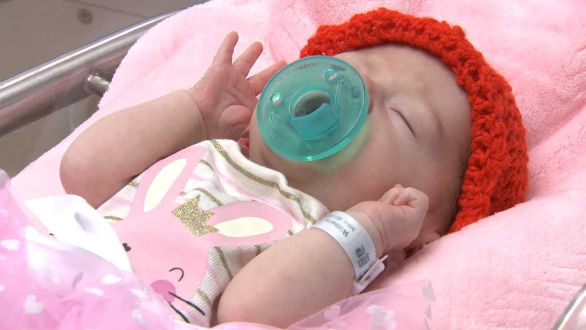 Newborns at Baptist Health Louisville receive red hats in honor of