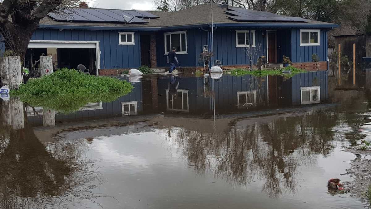 Flood waters near 18 homes in Acampo