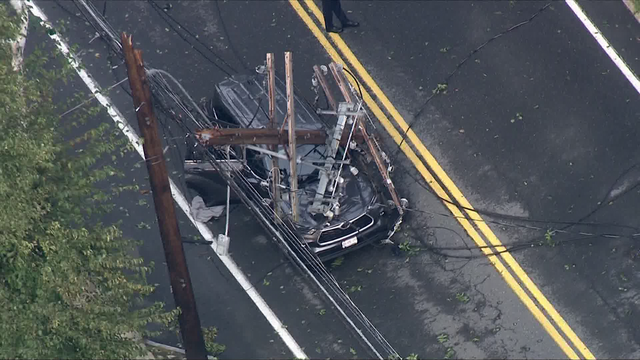 Driver escapes injury when utility pole snaps in Acton, Massachusetts, storm, crushes SUV - Vimarsana News