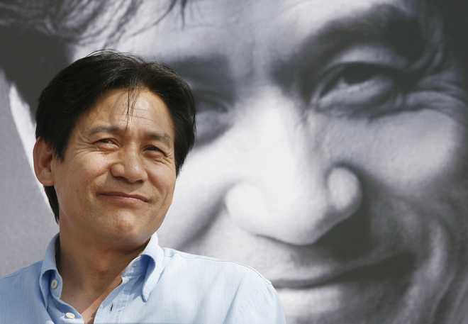 FILE - South Korean actor Ahn Sung-ki attends an event as part of the 11th Pusan International Film Festival in Busan, South Korea, Oct. 13, 2006.