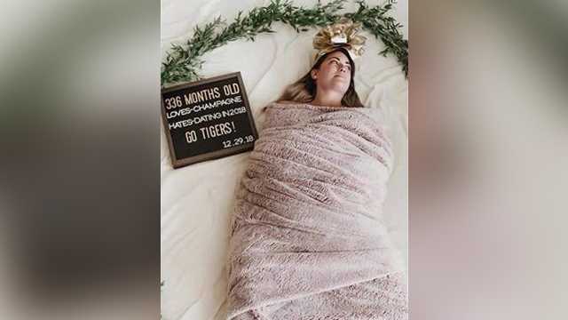 Woman Takes Hilarious Swaddling Photo To Celebrate Her 336 Month Birthday