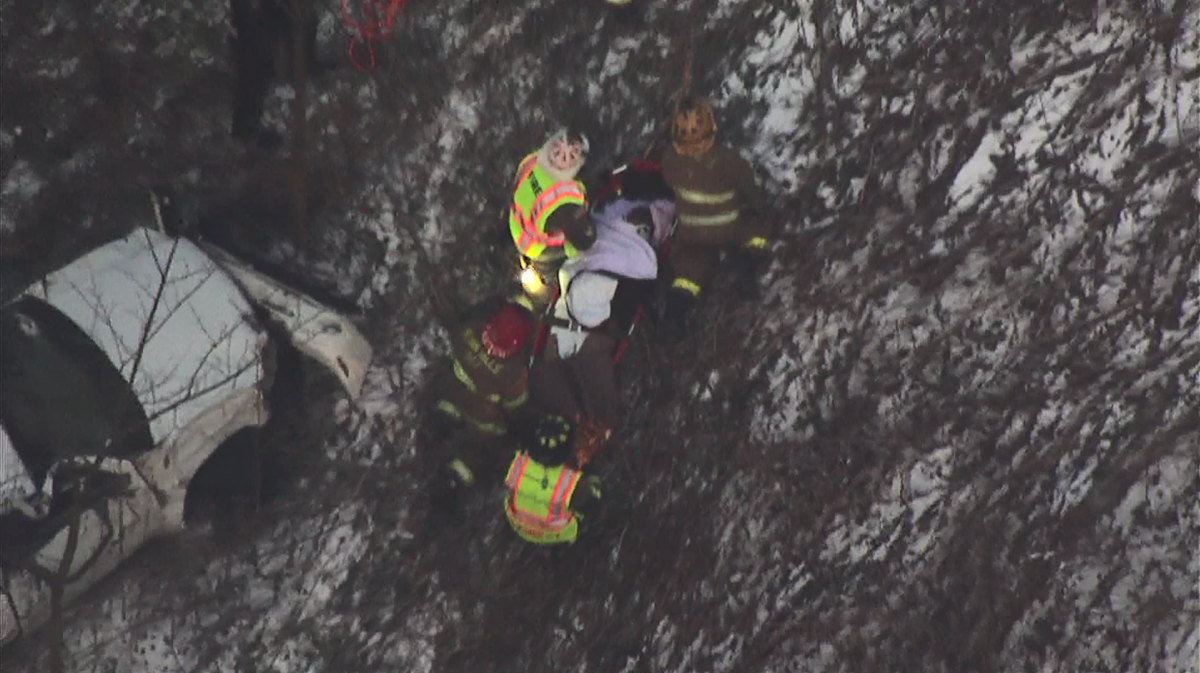 Man rescued after vehicle goes over hillside off Parkway East
