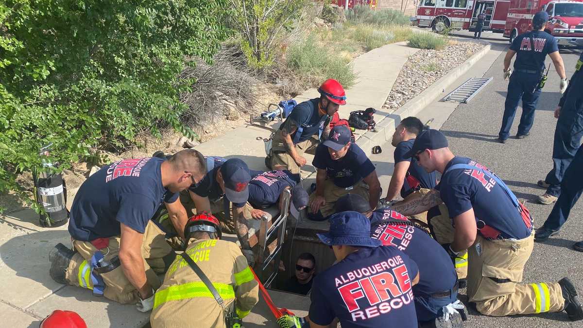 ABQ Fire Rescue help rescue a man trapped in a storm drain