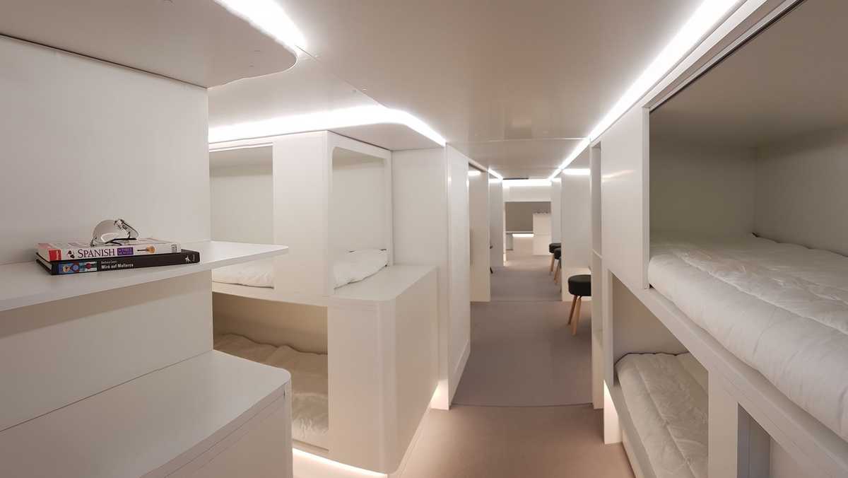 Airplane maker's new beds let passengers sleep in cargo hold