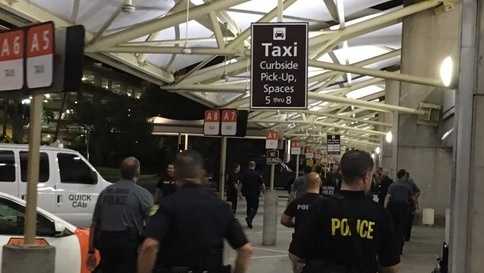Man accused of pointing gun at police officer at Orlando International ...