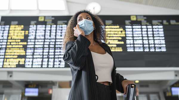 Stock image of woman at airport