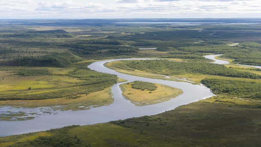 View of the Naknek River and tundra during the flight by seaplane from King Salmon on the Katmai Peninsula in Alaska, USA to Brooks Lake in Katmai National Park and Preserve.