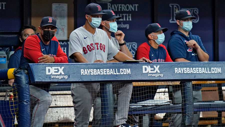 Tampa Bay Rays' Kevin Kiermaier puts on his sunglasses before a