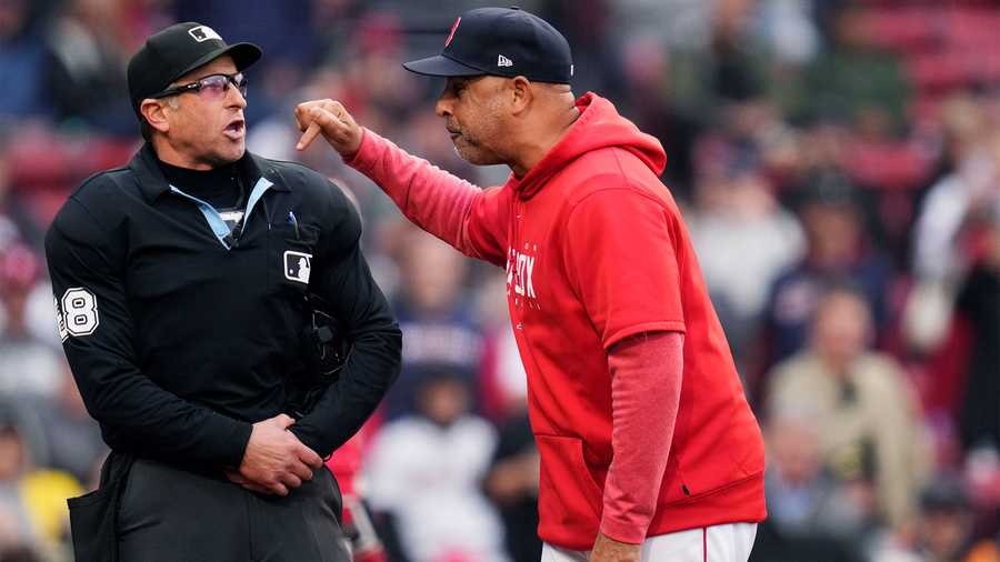 Boston Red Sox manager Alex Cora, right, argues with umpire Chris Guccione, left, at the top of the ninth inning of a baseball game against the Tampa Bay Rays at Fenway Park, Monday, June 5, 2023, in Boston. Cora was ejected from the game.