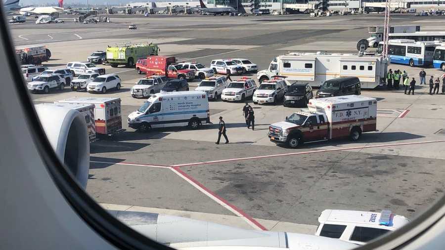 Plane quarantined in New York after about 100 passengers report feeling