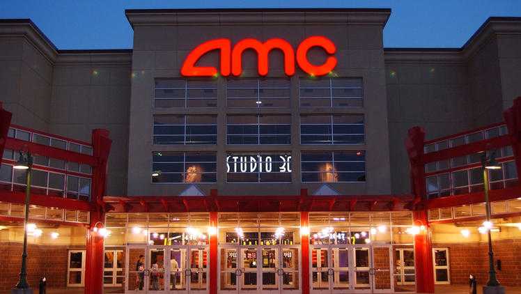 The outside of an AMC movie theater is shown.