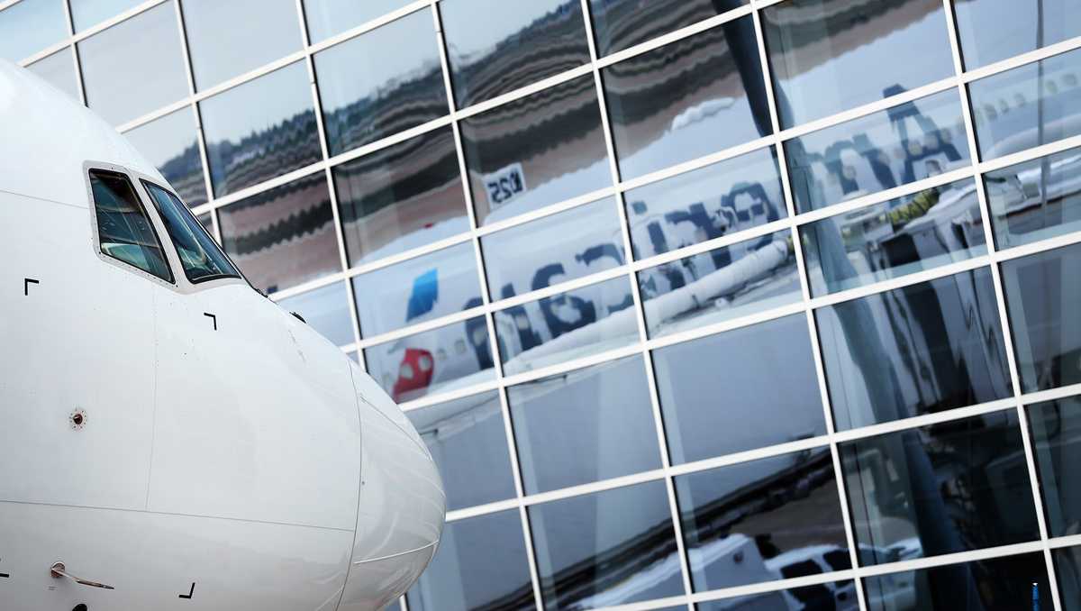 100 American Airlines flight attendants have coronavirus, union says