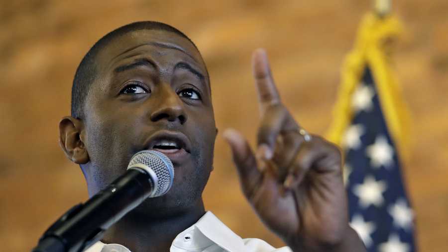 Democratic gubernatorial hopeful Andrew Gillum gestures as he speaks to the crowd during a campaign stop Friday, Aug. 17, 2018, in Tampa, Fla. (AP Photo/Chris O'Meara)