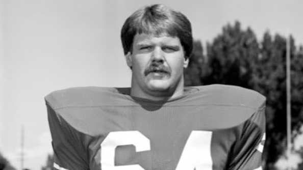 Did Andy Reid play in the NFL?