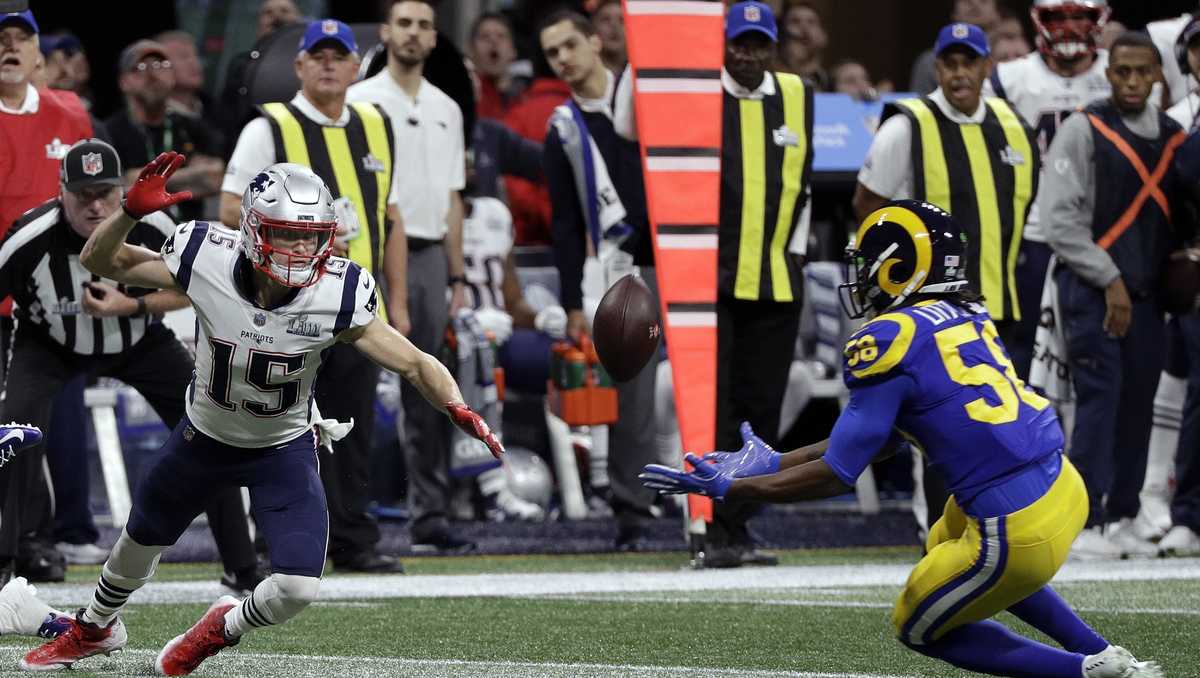 In this Sunday, Feb. 3, 2019, photo New England Patriots' Sony Michel (26)  dives over the goal line for a touchdown during the second half of the NFL Super  Bowl 53 football